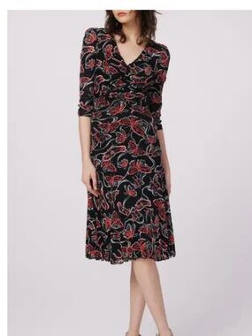 DVF reversible Black Floral and geometric V-Neck Dress with Red Accents. EUC